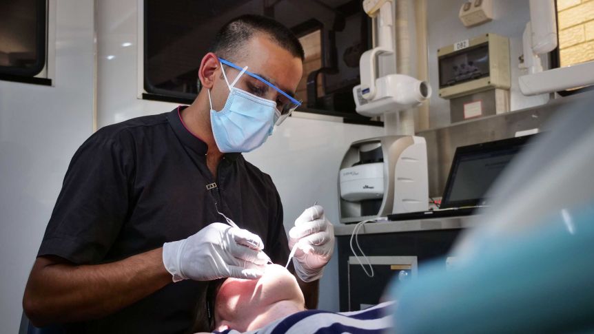 Dental care requires federally funded universal system, health experts say